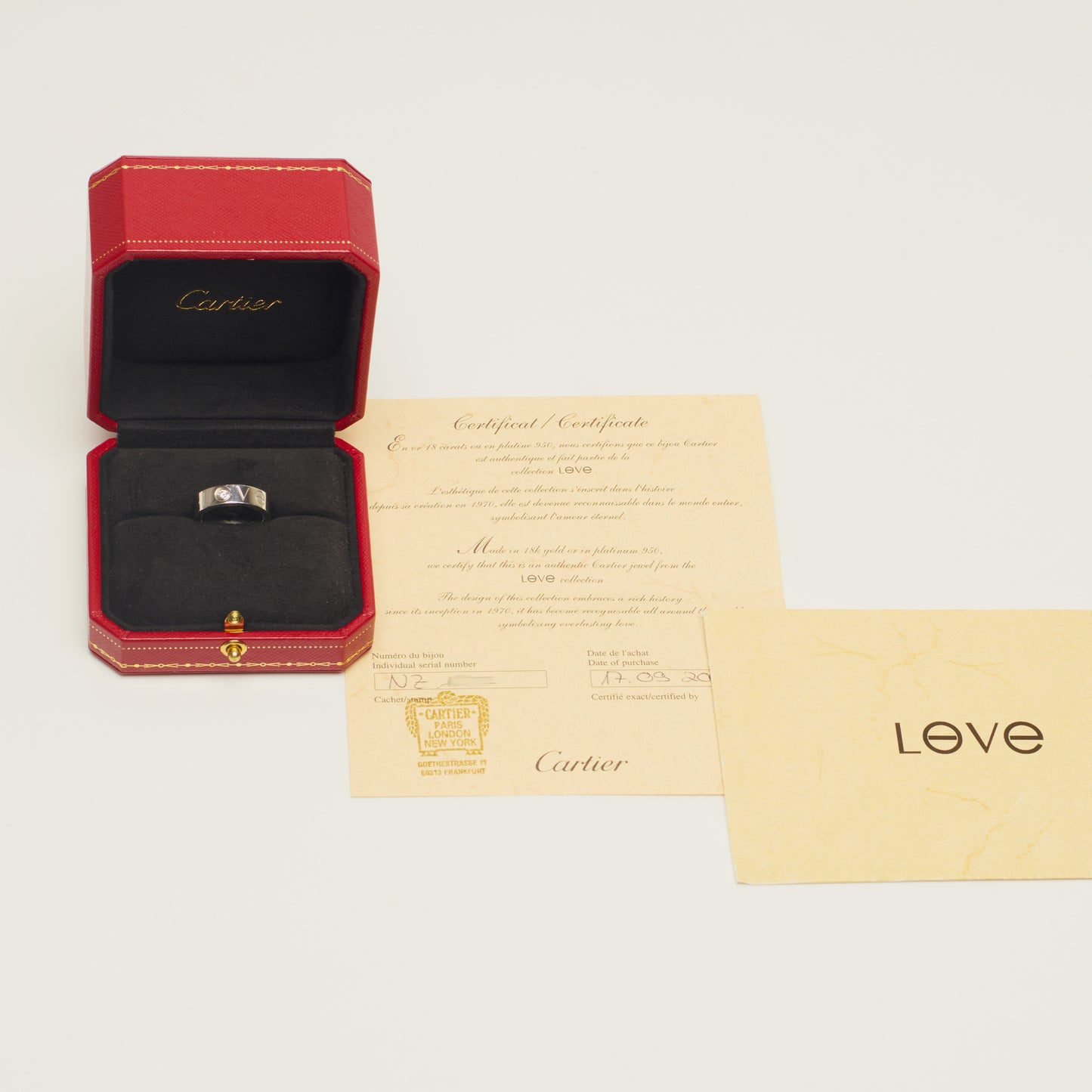 Bague Cartier Love Classique en or blanc et diamant taille 51