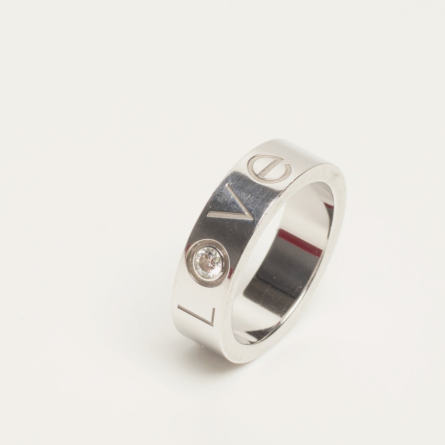 Bague Cartier Love Classique en or blanc et diamant taille 51