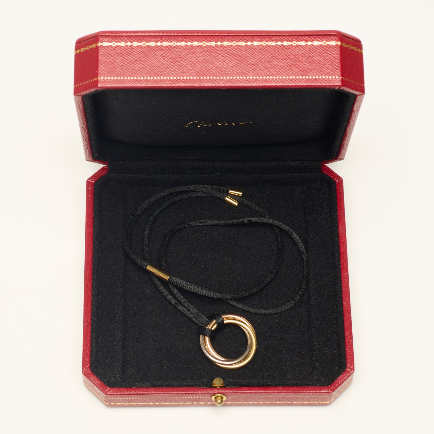 Collier Cartier Trinity Cord en or rose, jaune et blanc