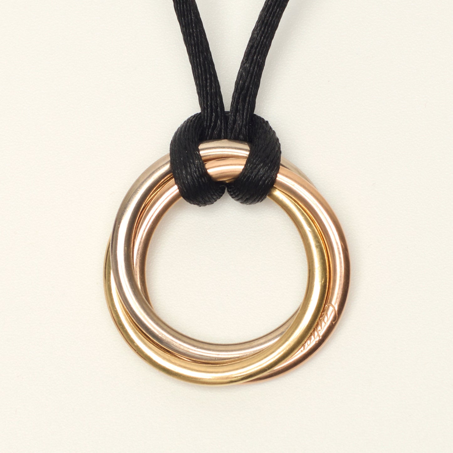 Collier Cartier Trinity Cord en or rose, jaune et blanc
